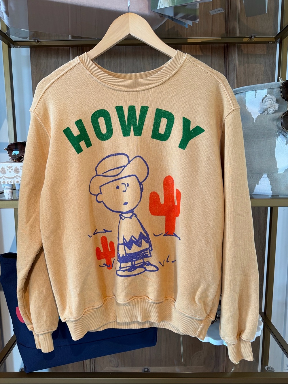 Tan "Howdy" Graphic Crewneck Sweater with Green Lettering